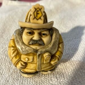 Potbelly figurine The flame tamer